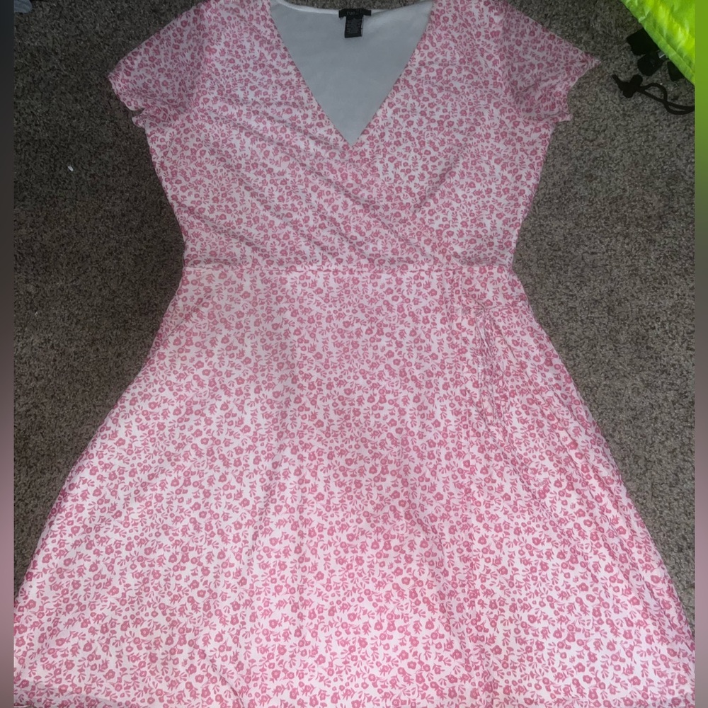- pink flowered knee length dress